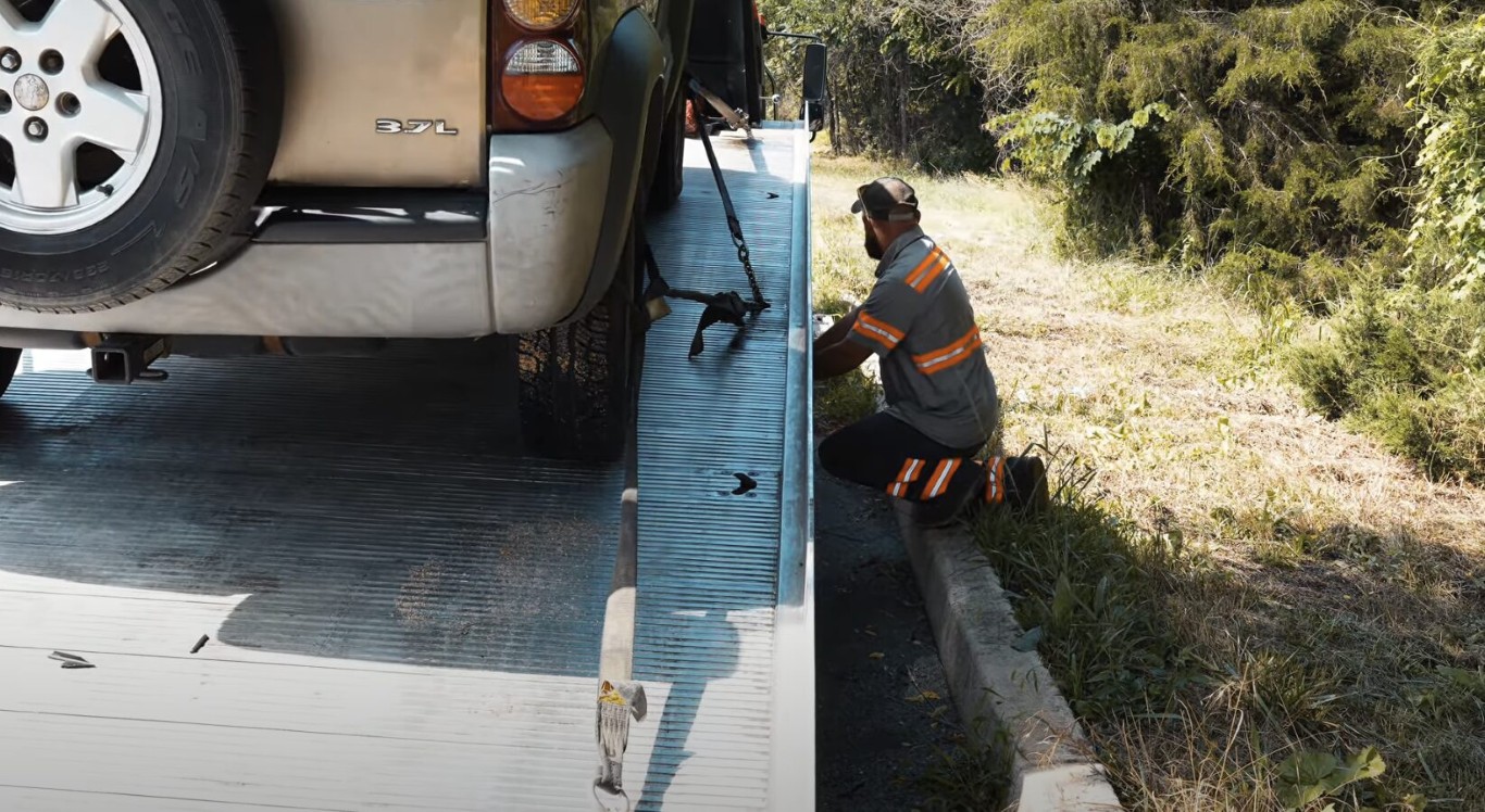 Tow service operator helping a driver locked out of their vehicle in Solana Beach, CA